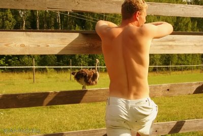 Dude with a chick (ostrich)