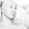 Bald with towel