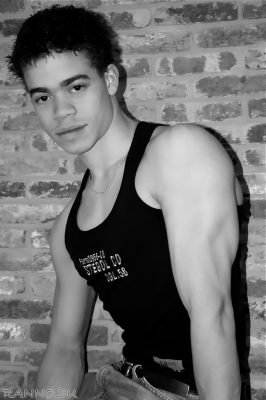 Steven black and white on brick wall