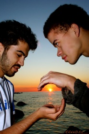 Ali and Steven holding Sun