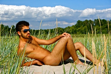 Ali posing on sand