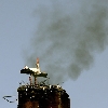 Smoking stork nest