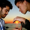 Ali and Steven holding Sun