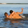 Anton and Ali playing in water
