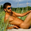 Ali posing on sand