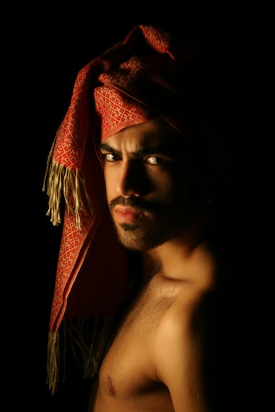 Ali wearing red scarf