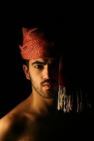 Ali wearing red scarf