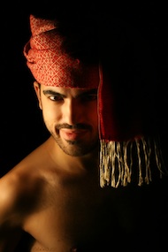 Ali wearing red scarf