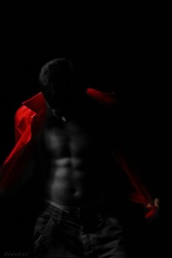 Ali exposing abs in red shirt