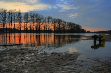Flooded public beach by river Emajõgi