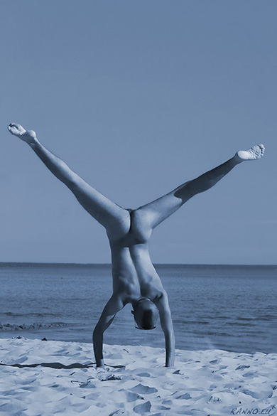 Nude handstand on Pärnu beach