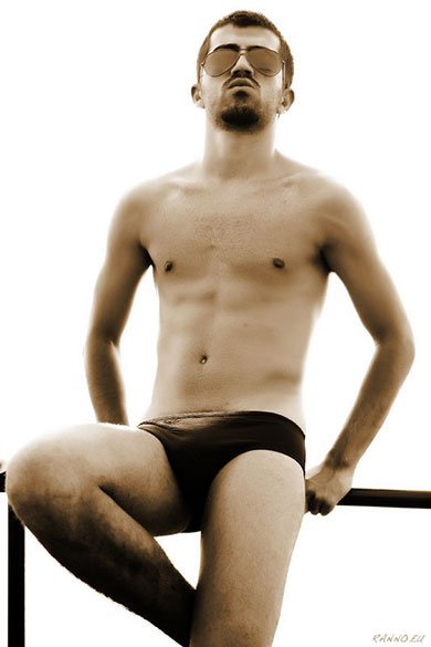 Ali on top of beach bench