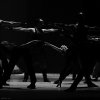Dancers on dark stage